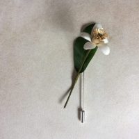ZAGARA lapel pin parchment